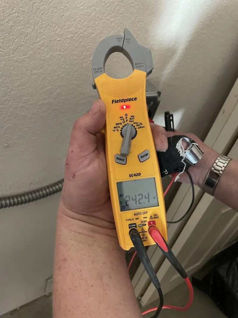 Voltage testing with clamp meter during Aluminum Wiring Replacement in Salisbury